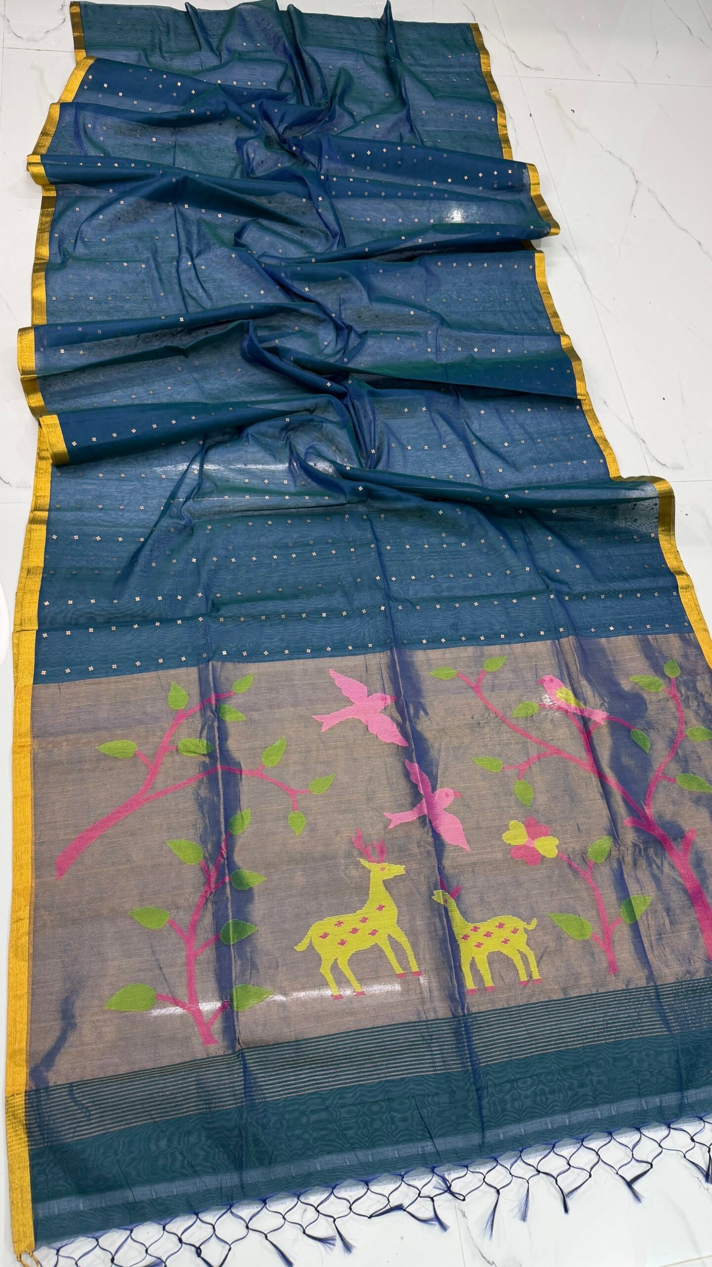 Exquisite Muslin Saree with Sequence Body and Handwoven Animal Motifs