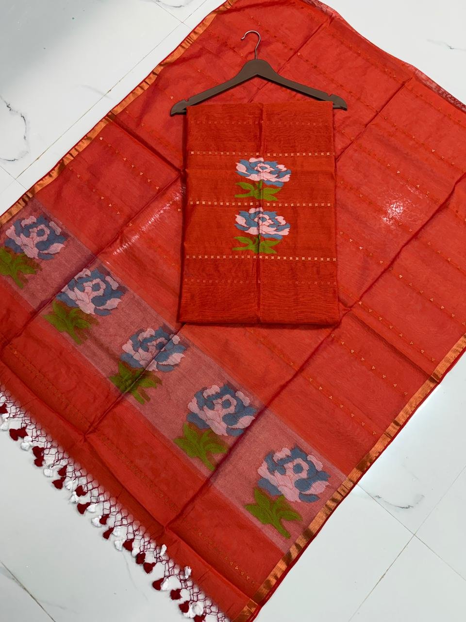 Exquisite Muslin Saree with Sequence Body and Handwoven Animal Motifs