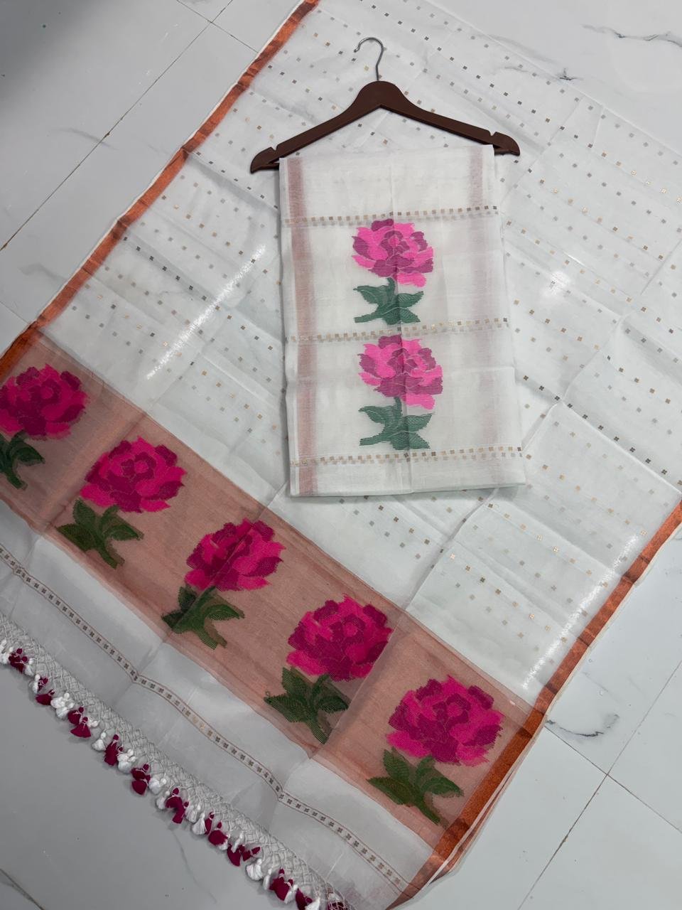 Exquisite Muslin Saree with Sequence Body and Handwoven Animal Motifs