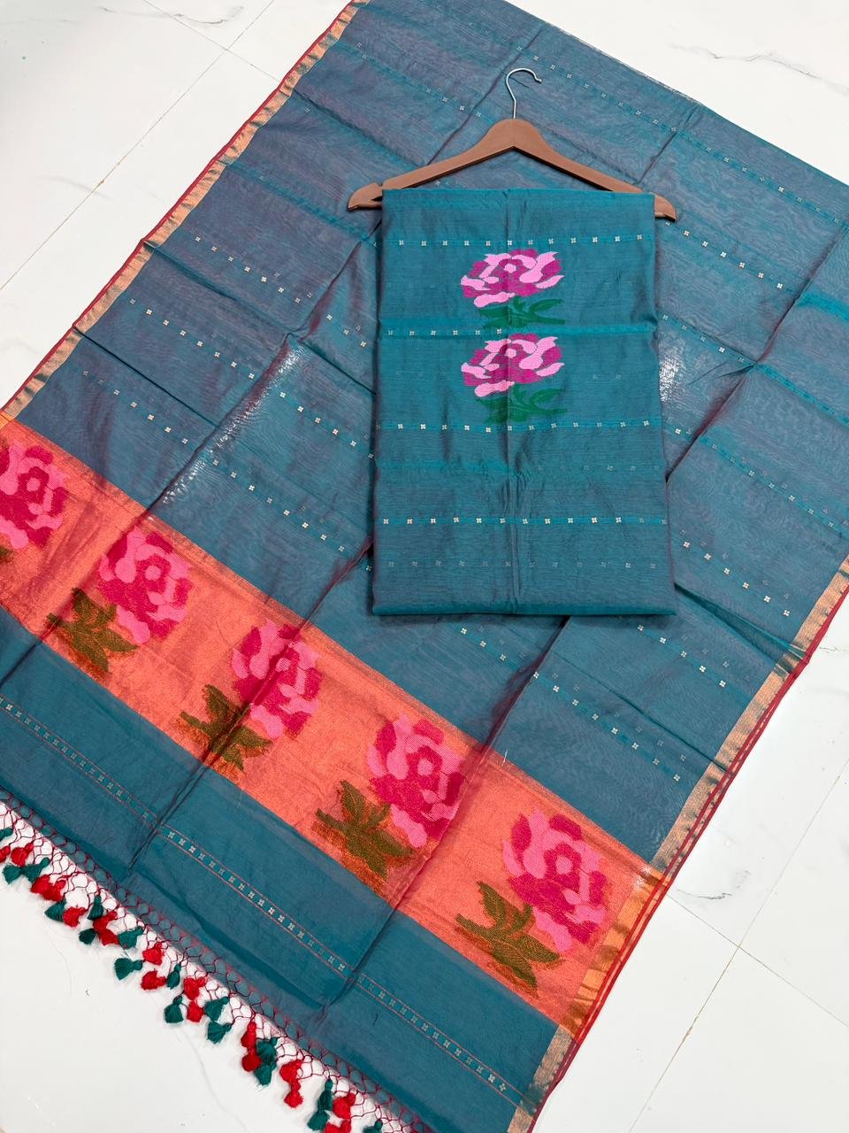 Exquisite Muslin Saree with Sequence Body and Handwoven Animal Motifs